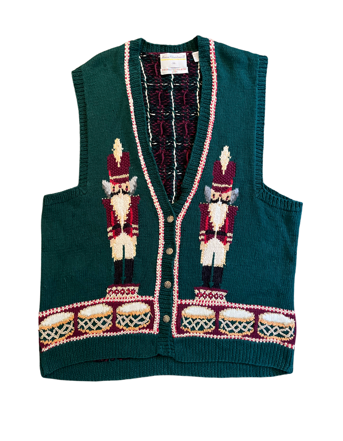 Front image of 1995 Christmas sweater with nutcrackers in size 3x on white background.