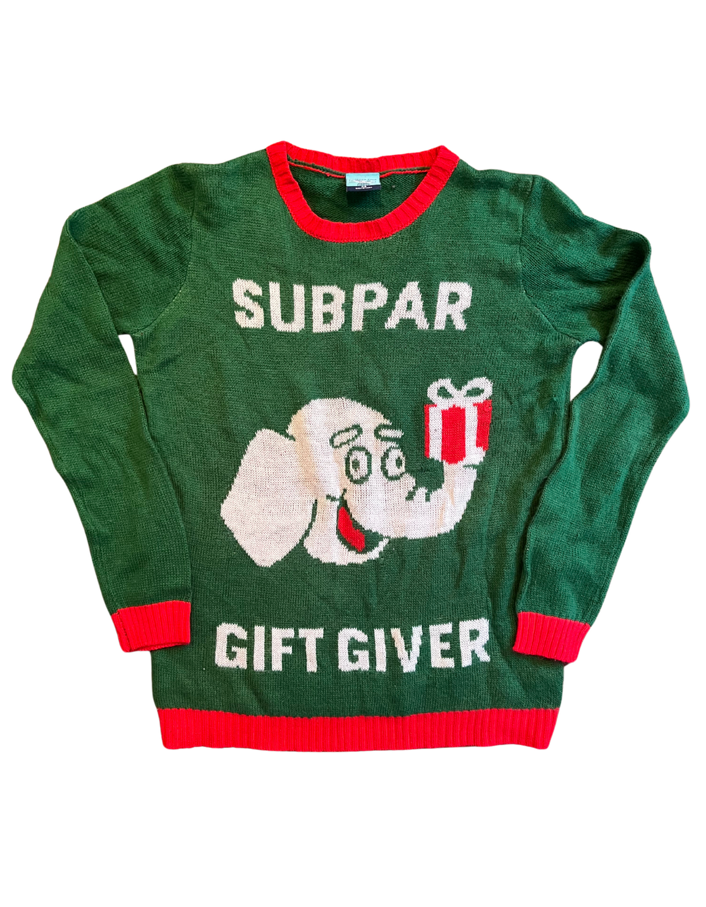 Front image of green and red sweater featuring elephant holding a gift with text reading subpar gift giver on white background.