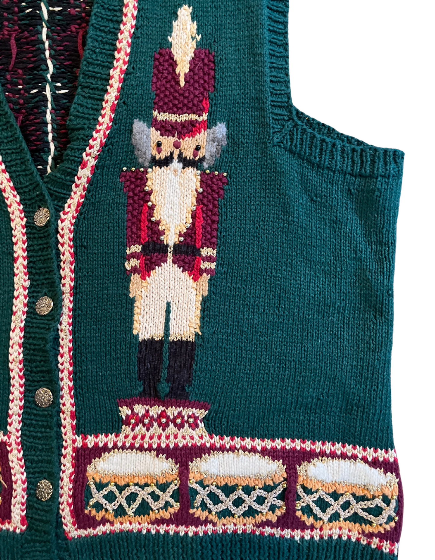 Front image of 1995 Christmas sweater with nutcrackers in size 3x on white background.