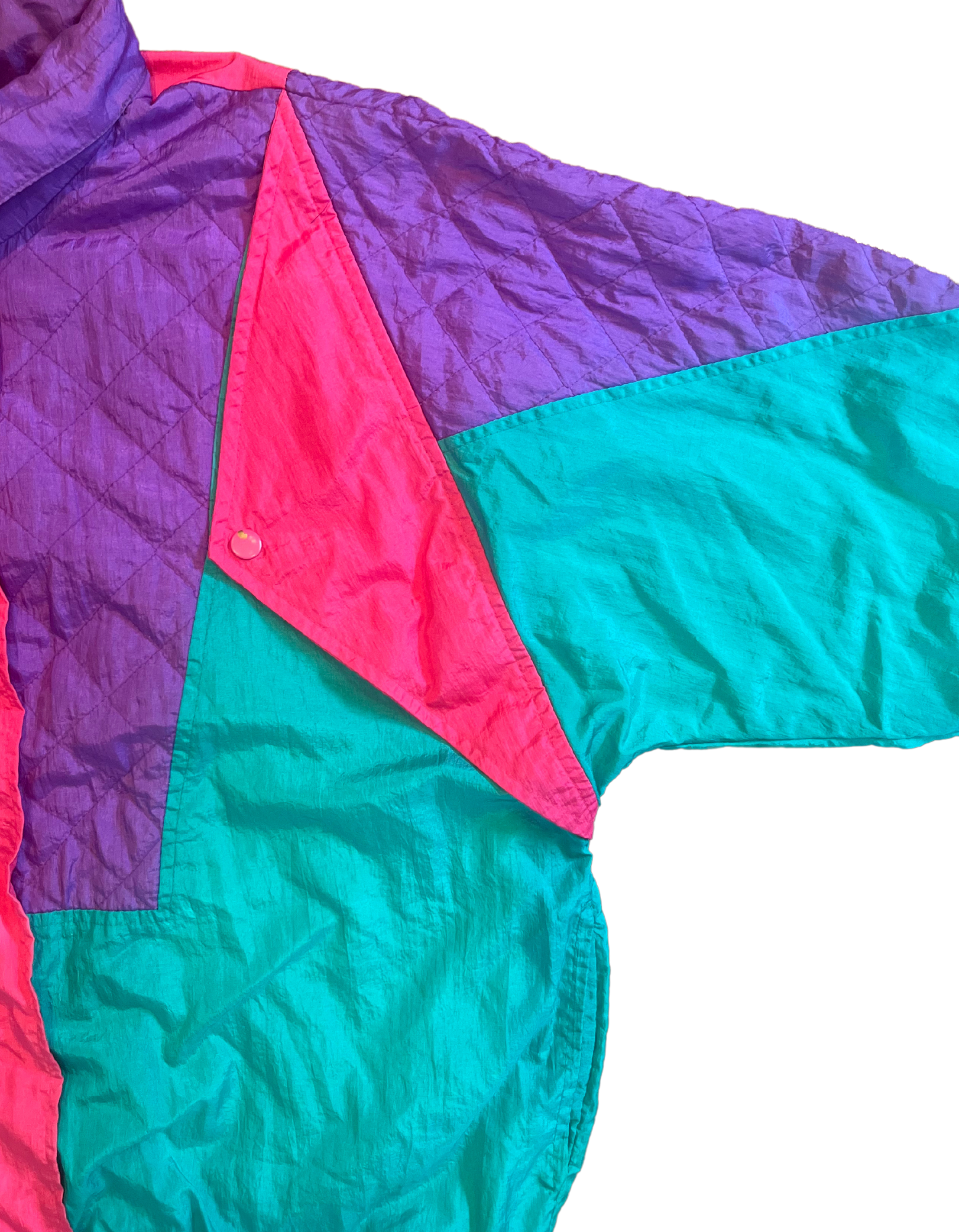 Front image of teal, purple and hot pink color pop windsuit featuring jackets on white background.