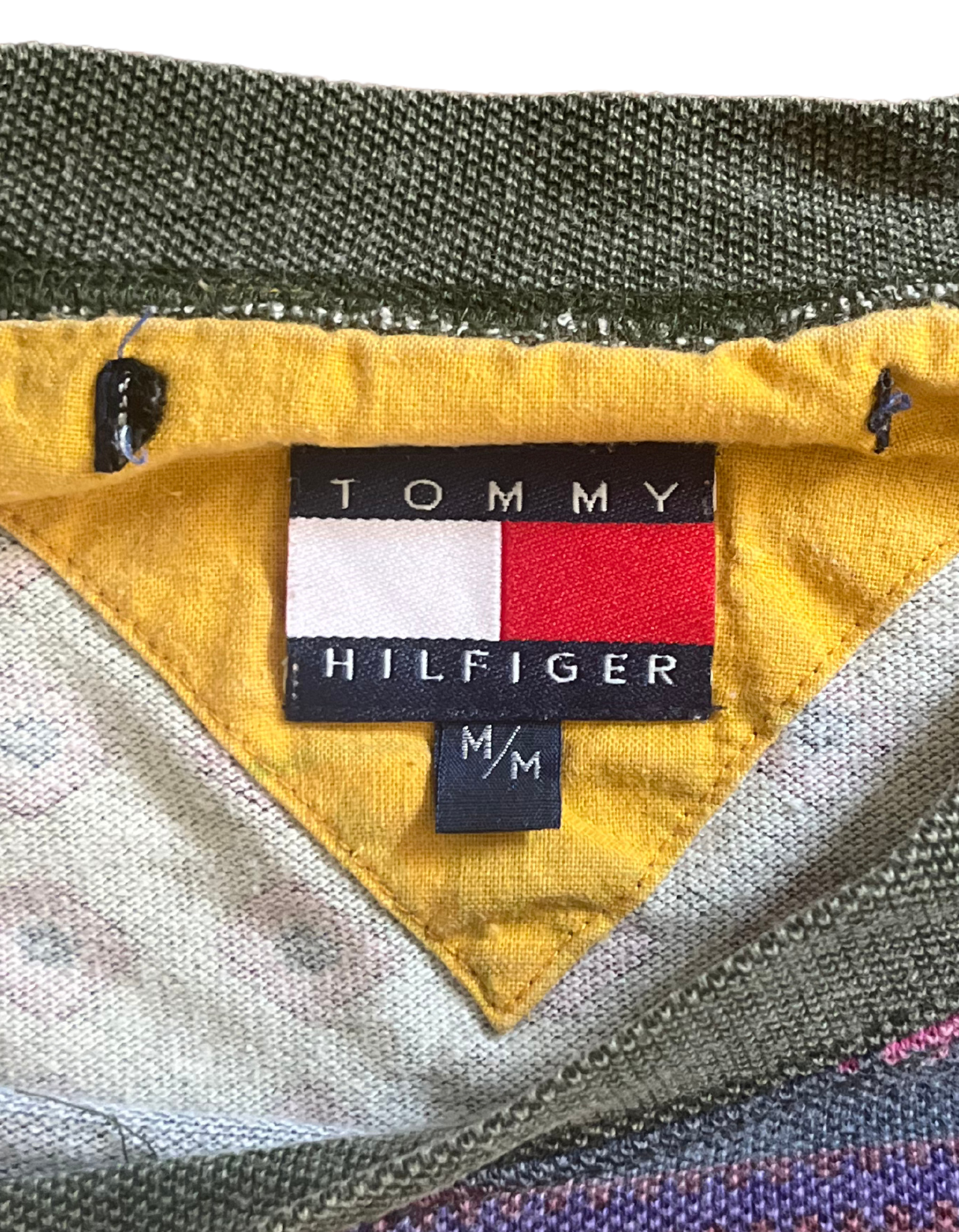 Tag image of long sleeve patchwork tommy hilfiger shirt on light background.