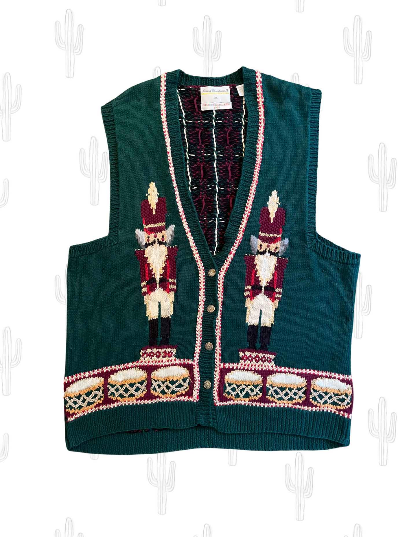 Front image of 1995 Christmas sweater with nutcrackers in size 3x on white background.