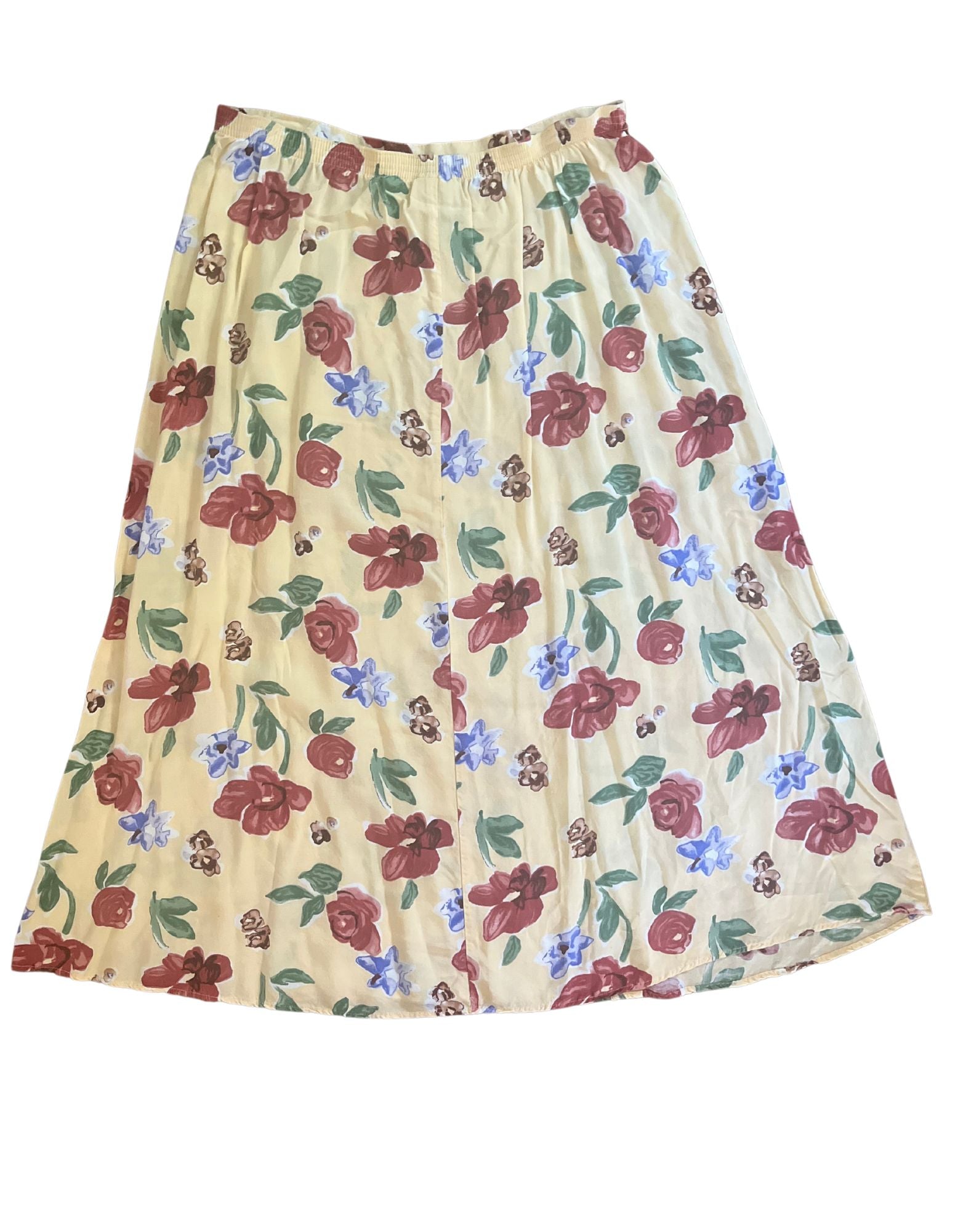 Back image of yellow floral pale yellow skirt with elastic waistband on white backgrouhd.