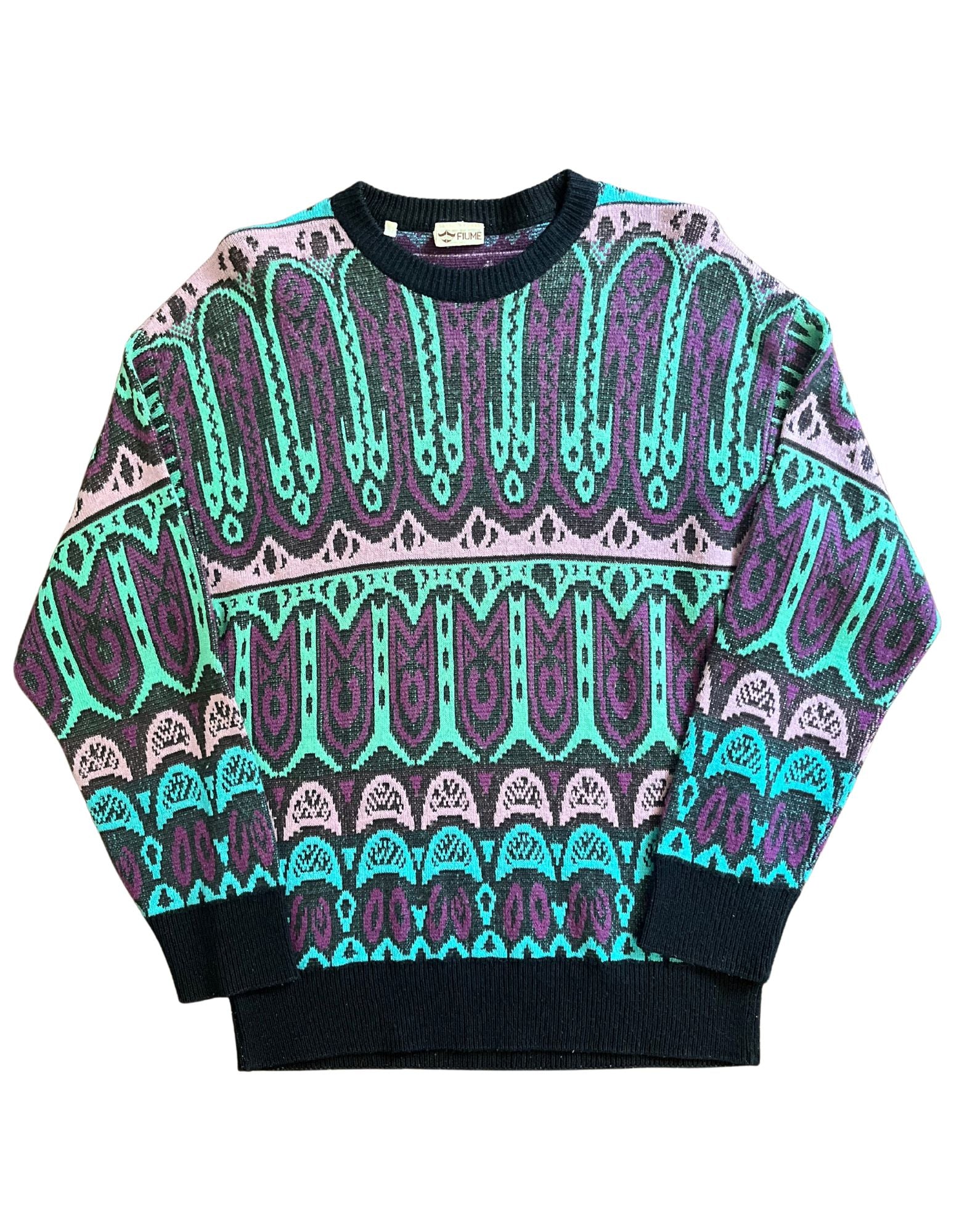 Front image of vintage purple, teal and black cosby sweater on white background.