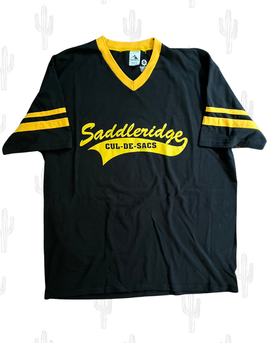 Front image of black and gold Saddleridge Cul-de-sacs ringer baseball tee on light background.