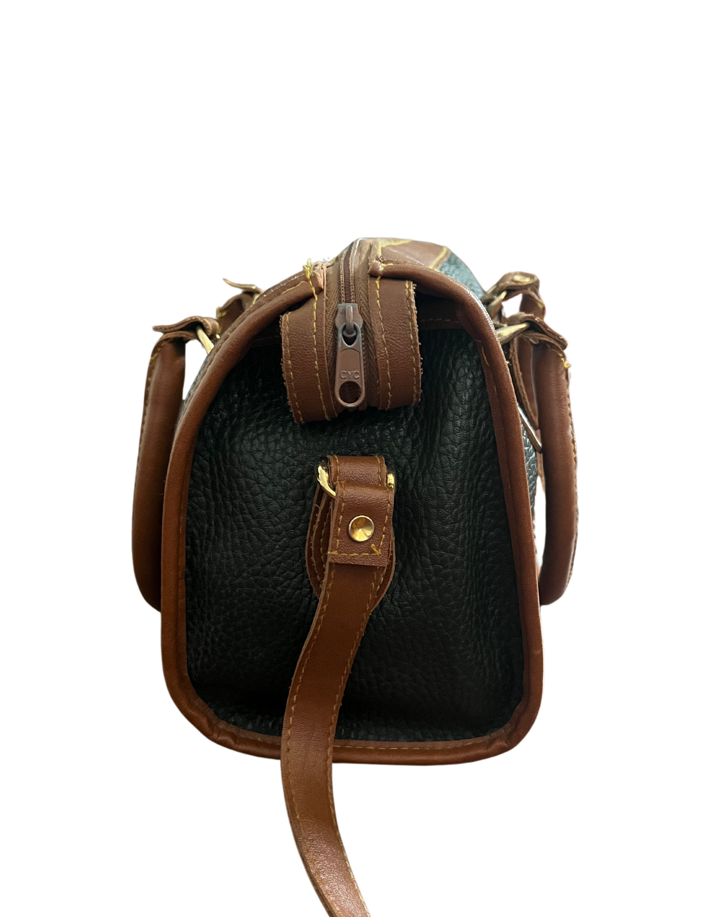 Side image of green and tan shoulder bag on white background.