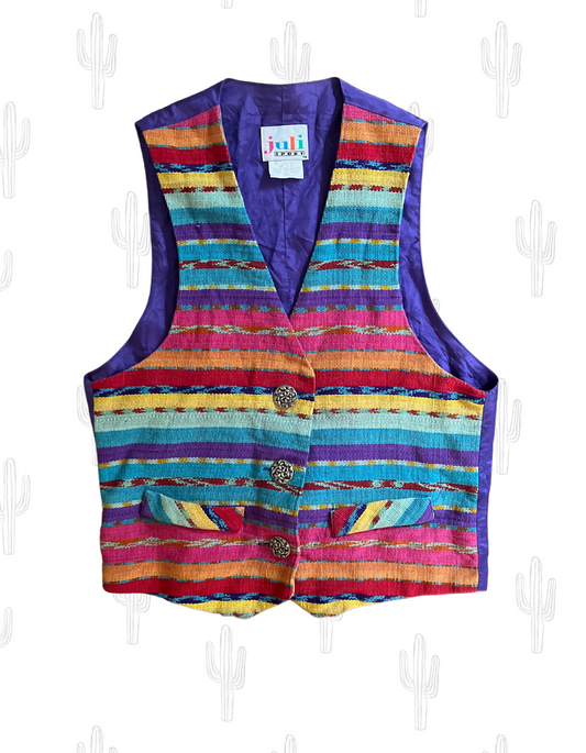 Front image of rainbow woven vest on white background.